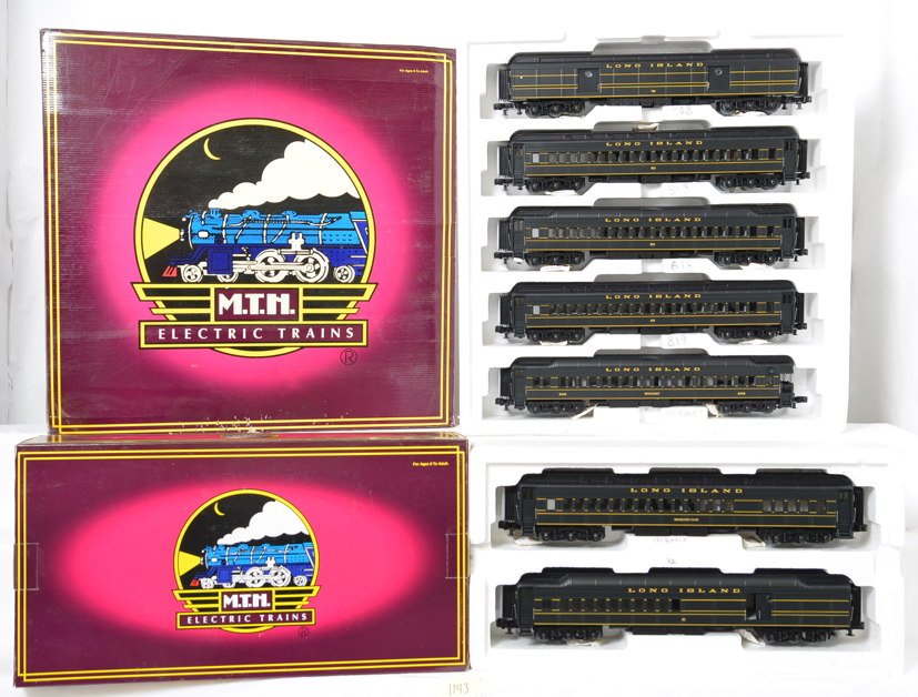 7 Long Island Railroad Madison passenger cars 4057 4157: MTH modern O gauge Long Island Railroad Madison passenger cars in OBs. Includes 20-4057 five car set and 20-4157 combo / diner set. Cars are generally C8. OBs have moderate wear, the five car box has 