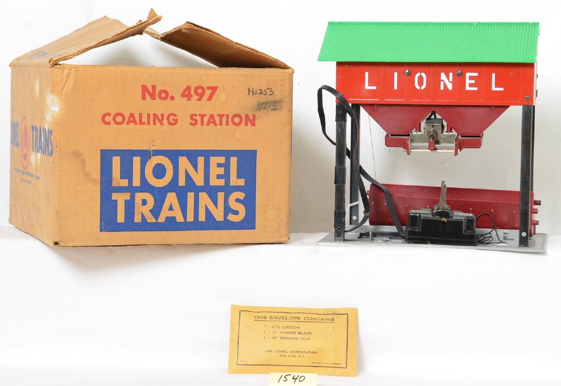 Lionel 497 coaling station in original box with: Postwar Lionel O gauge 497 coaling station in original box with insert and controller, C6++. Box is square and solid with no torn or missing flaps.