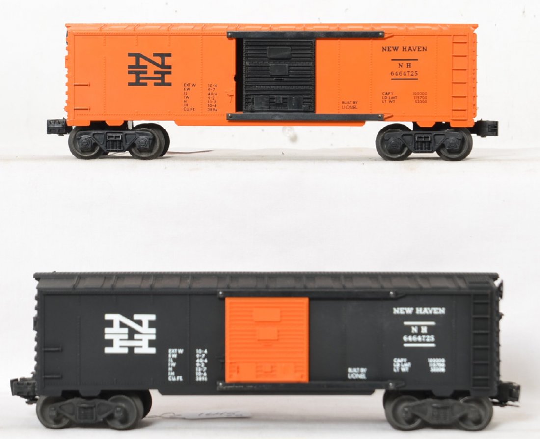 Lionel 6464-725 New Haven, orange and black bodies: Postwar Lionel O gauge 6464-725, orange body with black doors and black with orange doors. Trains look unrun C8-9.