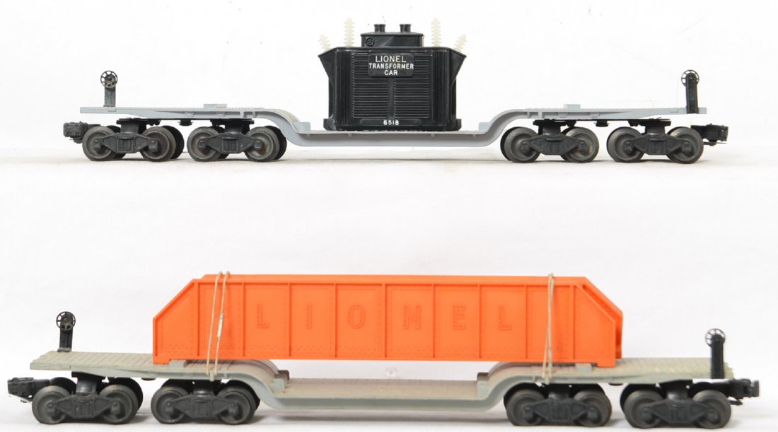 Lionel 6418 and 6518 depressed center flatcars: Postwar Lionel 6418 machinery car with bridge girders and 6518 transformer car. Trains should clean C7.