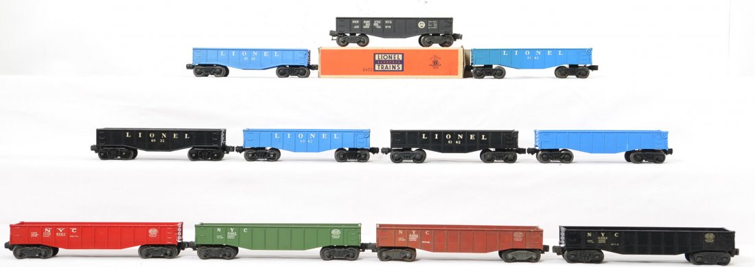 Large lot of Lionel gondolas 6452, 6462, etc: Lionel Postwar O gauge gondolas including seven 6462, three 6142, 6032, 6042, three 6112, two 6452, 2452, 6562, 6162, 6002, 6062, and unlettered blue short gondola. This is a General Condition lot mea