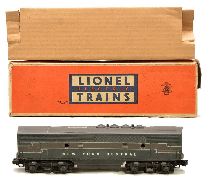 Lionel 2344C NYC F3 B Unit Boxed: Lionel postwar 2344C New York Central F3 B unit in OB with original cardboard insert. The unit is missing two portholes and the cab has some slight warpage. The B unit is C6-7. The box is missing one