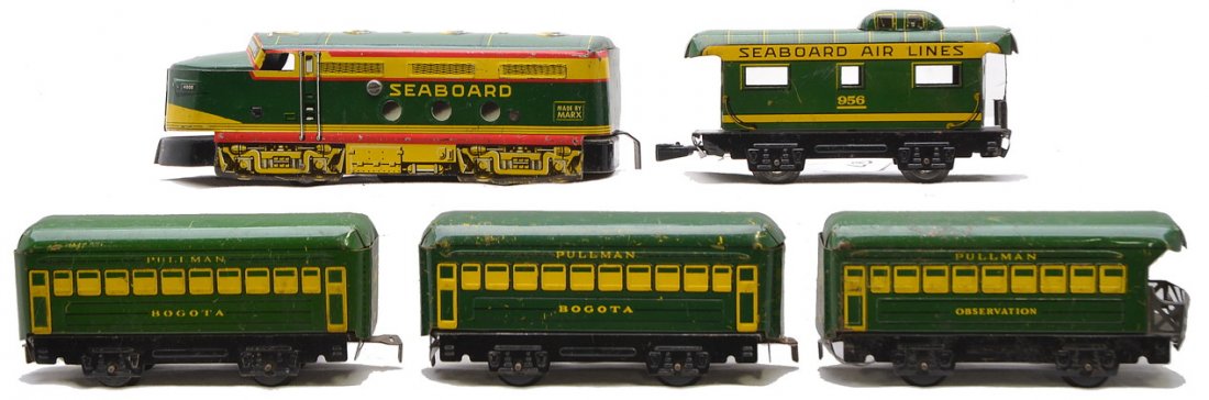 Marx Litho 4000 Seaboard Loco & Pass Cars: Marx lithographed 4000 Seaboard electric diesel with three lithographed four-wheel passenger cars; two Bogata Pullmans and an observation car, C5. Also included is a 956 Seaboard caboose, C5.