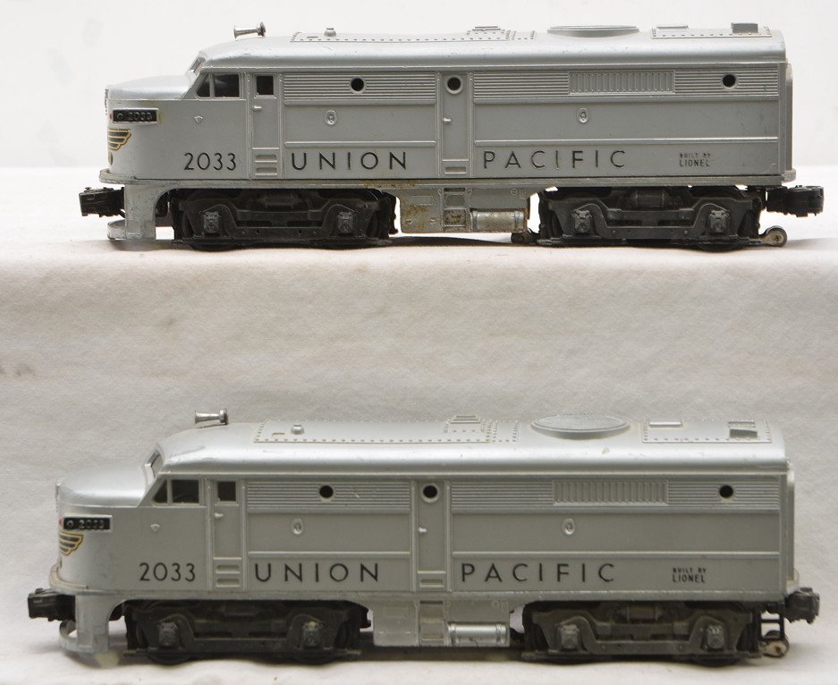 Lionel 2023 Silver UP Alco AA Diesel Units: Lionel postwar 2023 silver Union Pacific Alco AA diesel units. The power A unit has heavy battery damage and is missing the battery cover. The power A unit is C4. The dummy A is C6.