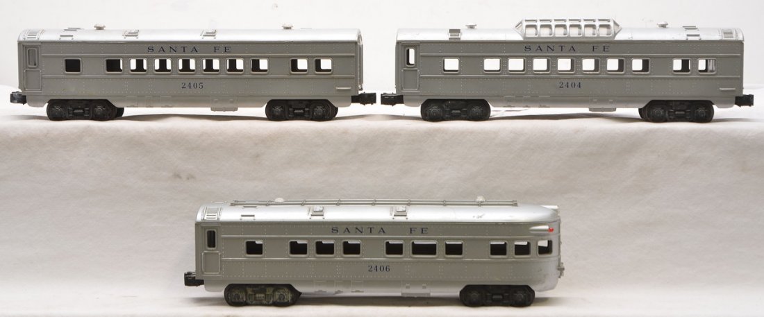Lionel Silver SF Passenger Cars 2405 2404 2406: Lionel postwar silver Santa Fe passenger cars including; 2405 Pullman, 2404 vista dome and a 2406 observation. Cars are C6.