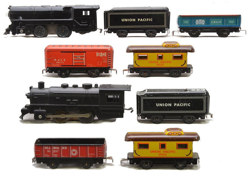 Marx two Lithographed Freight Sets: Marx lithographed freight set no. 526 including; 401 black steam loco, 551 Union Pacific tender, 91257 red Seaboard gondola and a 3824 yellow and brown Union Pacific caboose. Also included is a Marx l