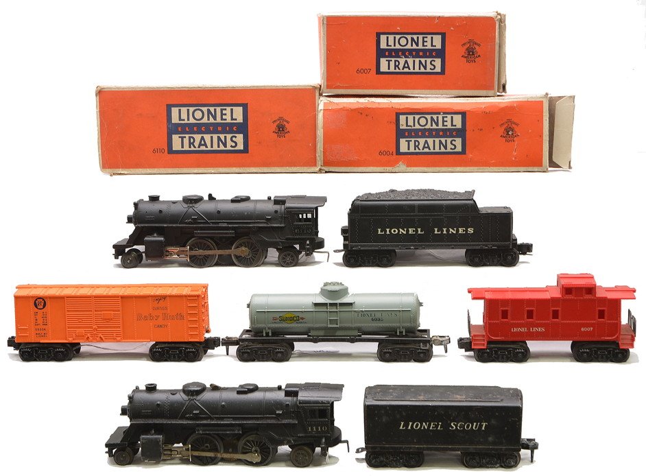 Lionel 6110 6001T 1110 1001T 6035 6004 6007: Lionel postwar 6110 black steam loco in OB with a 6001T tender and an 1110 steam loco with a 1001T Lionel Scout tender. Also included are freight cars; 6035 gray Sunoco tank, 6004 orange Baby Ruth box