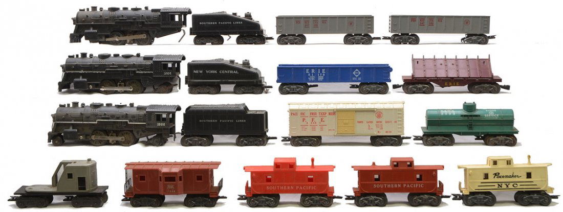 Marx 3-1666 Locos w/Tenders & Freight Cars: Marx three 1666 black steam locos with tenders and a selection of freight cars. Please view photo to verify selection and condition. This lot will be sold as is with no returns.