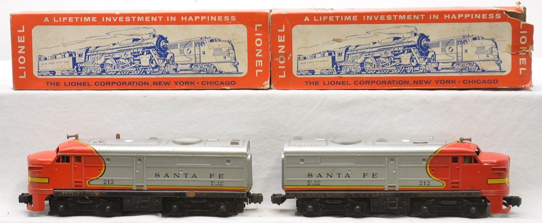Lionel 212 Santa Fe Alco AA Diesel Units: Lionel postwar 212 Santa Fe Alco AA diesel units in incorrect 218T boxes. The power unit has a cracked pilot skirt and the wheels on both units have rust.