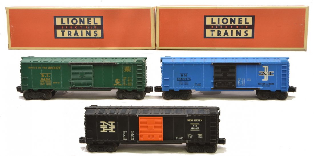Lionel 6464-75 6464-425 6464-475 Boxcars: Lionel postwar 6464-75 Rock Island type I boxcar, 6464-425 New Haven type III boxcar and a 6464-475 Boston and Maine type IV boxcar, C7. Also included are two reproduction boxes.