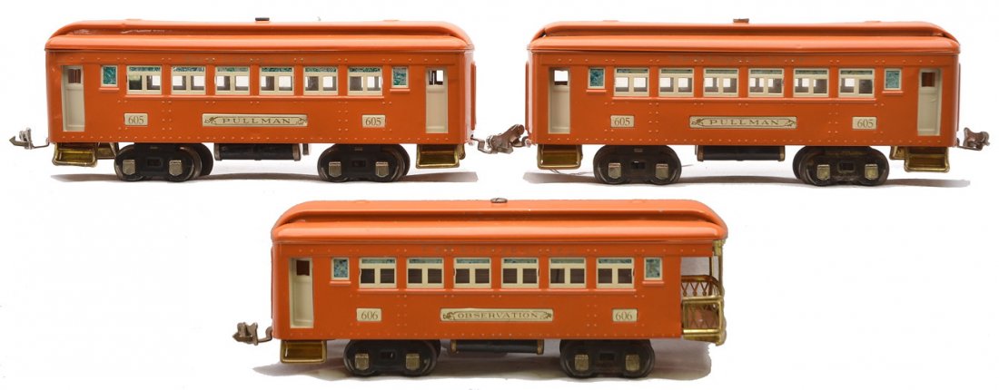 Lionel Orange Passenger Cars 2-605 606: Lionel prewar O gauge orange passenger cars with cream inserts and nickel journals; two 605 Pullmans and a 606 observation. Cars have been restored.