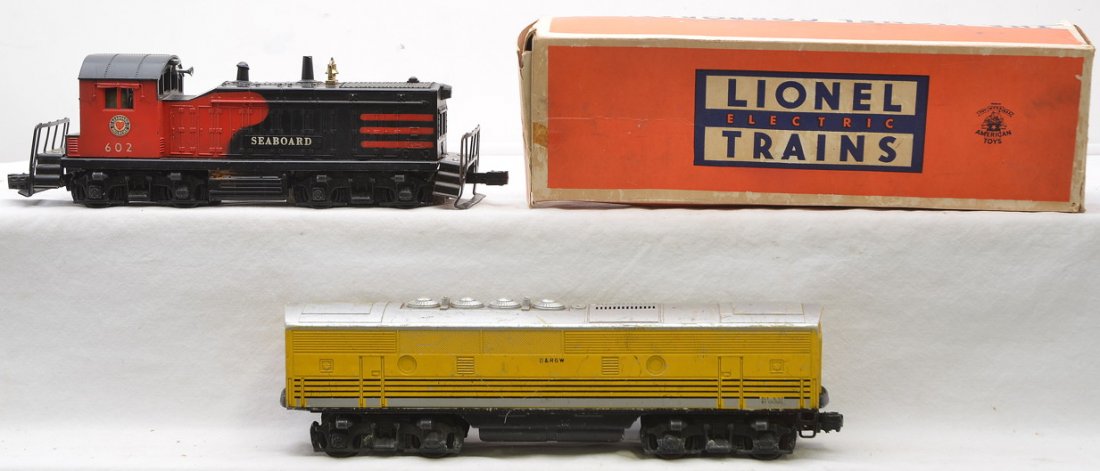 Lionel 602 Seaboard NW2 Switcher OB 2379 RG Unit: Lionel postwar 602 Seaboard NW2 switcher in OB. The front of the cab is broken out by the screw, C5. Also included is a 2379 Rio Grande F3 B unit with missing two steps and one coupler, C4.