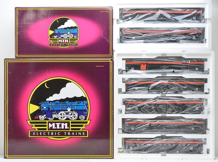 MTH NH Streamline Pass 20-6562 20-6662 MIB: MTH 20-6562 New Haven 5-car 70 ft. ABS streamlined passenger set including; baggage, three coaches and an observation and a 20-6662 New Haven 2-car 70 ft. ABS streamlined sleeper/diner set both in OBs