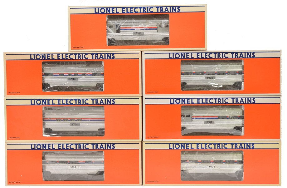 Lionel Amtrak Aluminum Pass Cars 19100-19106: Lionel Amtrak aluminum passenger cars including; 19100 baggage, 19101 combo, 19102 Pullman, 19103 vista dome, 19104 diner, 19105 full vista dome and a 19106 observation all in OBs. The 19104 and 19105