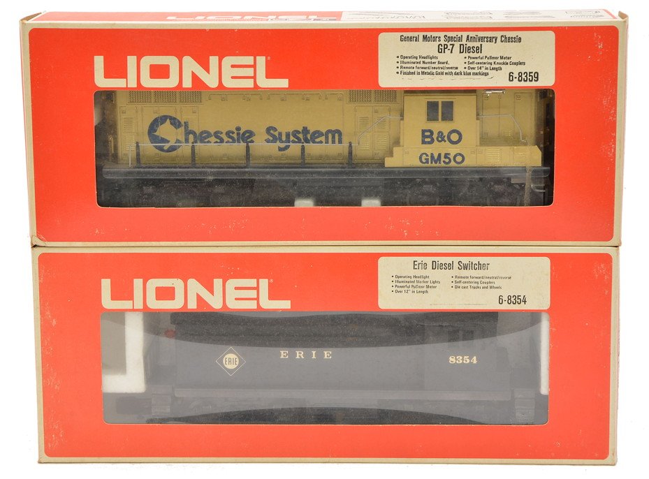 Lionel 8354 Erie Switcher 8359 GM Chessie GP7: Lionel 8354 Erie diesel switcher and an 8359 General Motors Special Anniversary Chessie GP7 diesel both in OBs, C8.