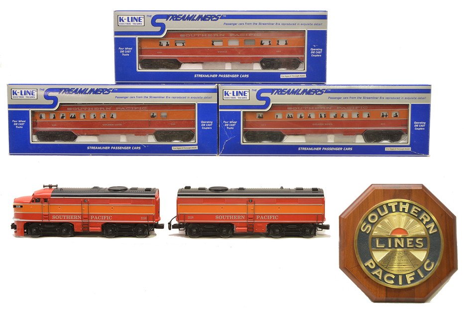 K-Line SP Daylight 2158 AB & Passenger Cars: K-Line 2158 Southern Pacific Alco AB diesel units and a wooden and metal Southern Pacific Lines plaque. Also included are Southern Pacific Daylight streamliners passenger cars; K4588-0343 Golden Lute 