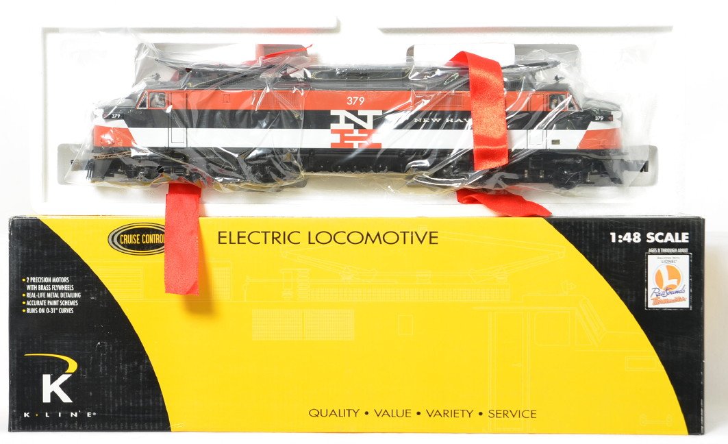 K Line New Haven EP-5 with TMCC: K Line modern O gauge K2749-0379CC New Haven EP-5 electric loco in OB. Loco features TMCC, Railsounds, Electrocouplers, and much more. Loco is C9-10 and appears unrun beyond a factory test.