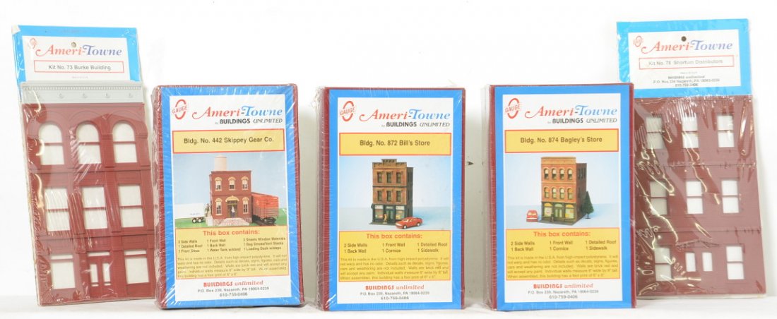 5 Ameri-Towne kits and building fronts 872, 874, 442,: Ameri-Towne modern O gauge building kits and fronts. Includes 872 BillÃ•s Store, 874 BagleyÃ•s Store, 442 Skippey Gear Co. 73 Burke Building front, and 78 Shortum distributors building front. Al