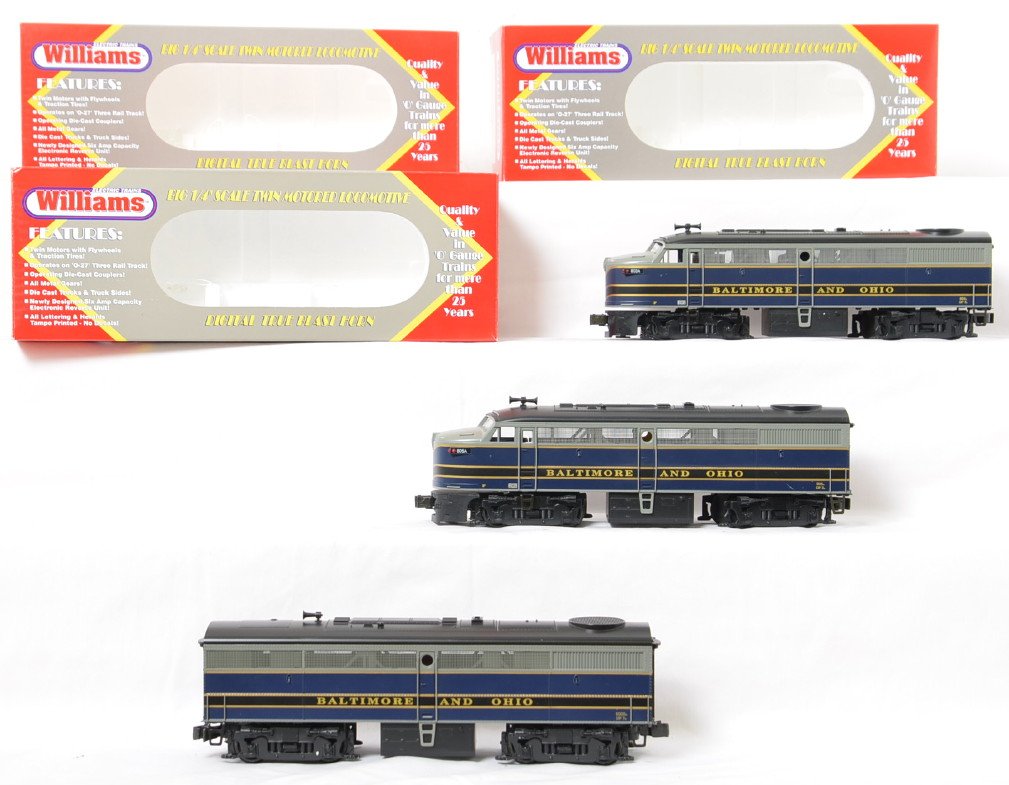 Williams B&O Alco FA A-B-A set: Williams modern O gauge Baltimore and Ohio FA1001 power A with horn and dummy A in OBs. C7 due to a broken brake shoe on the dummy A otherwise C8. FB101D B and O dummy B in OB C8 with run time.