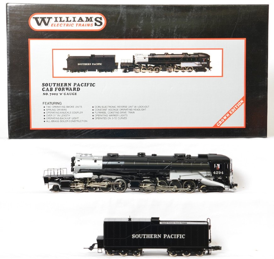 Williams Southern Pacific 7002 Cab Forward: Williams modern O gauge 7002 Southern Pacific brass cab forward steam locomotive in OB. Loco features smoke, constant voltage lights, and more. Loco is C8+ with light run time.