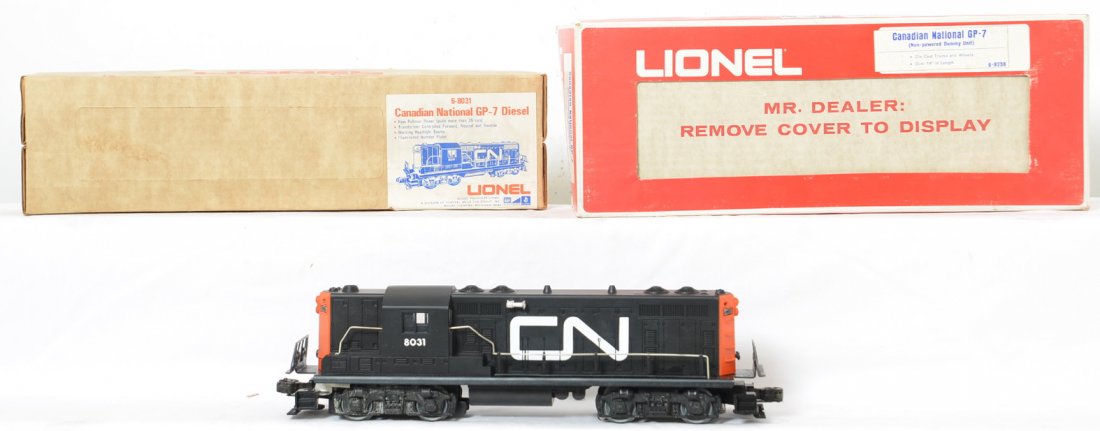 Lionel Canadian National GP-7 pair 8031 8258: Lionel modern O gauge Canadian National GP-7 diesel locomotive pair in OBs. Includes 8031 powered and 8258 dummy. Locos are C8 with run time. OBs have some light shelf wear.