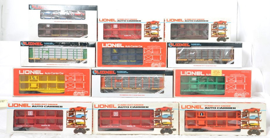 12 Lionel auto carriers 9145, 9281, 16215, 9281, etc: Lionel modern O gauge auto carriers in OBs. Twelve cars include 9351 Pennsylvania, 16214 Rio Grande, 16215 Conrail, 16217 Burlington Northern, 9145 Illinois Central, two 9123 Chesapeake and Ohio, thre