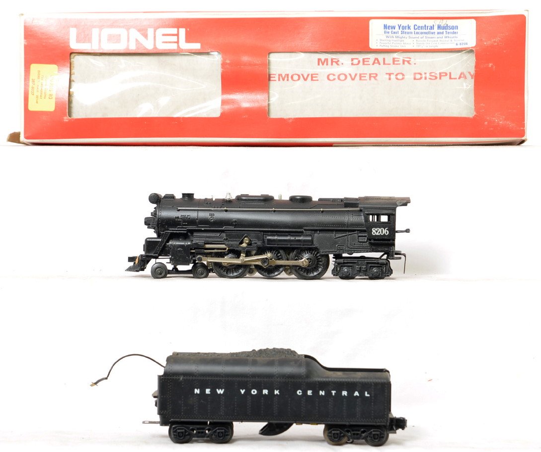 Lionel 8206 New York Central Hudson: Lionel modern O gauge 8206 New York Central Hudson steam locomotive in OB. Loco is C7 with one bent cab corner with some missing paint. OB has light wear and one small rip.