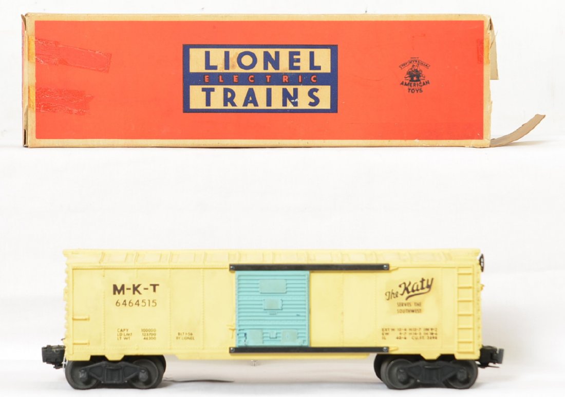 Lionel Postwar 6464-515 Girls train MKT boxcar in OB: All original, one-owner piece in great shape with no chips, cracks or broken parts. The lettering has some wear on one side as seen and it is dirty but was well loved and could clean up to be a bit ni