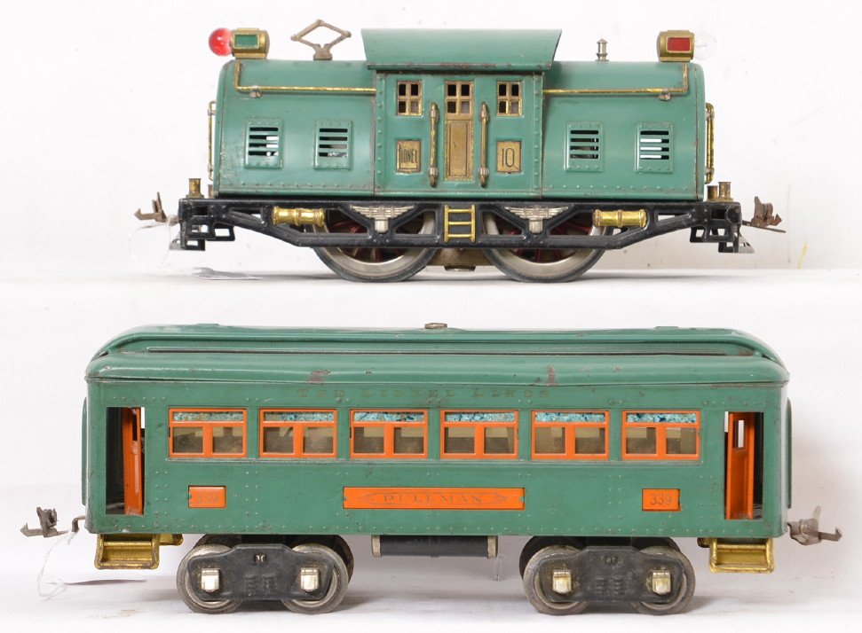 Lionel Standard Gauge 10 339 Peacock: Includes # 10 electric locomotive with gold painted cast lamps and all original parts and a 339 Pullman car with all original parts as well. Both cars have paint wear and some surface oxidation or cor