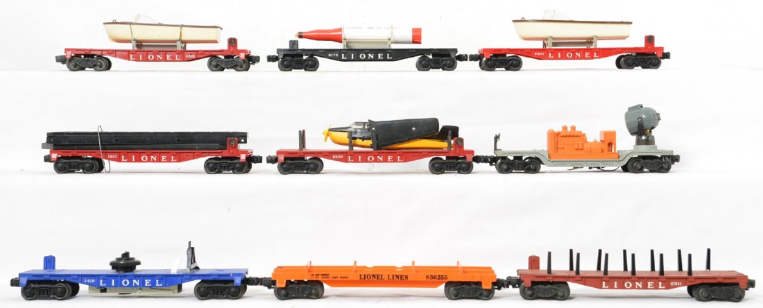Lionel Postwar O flat cars 3419 6175 6801 6800 3520 etc: Includes one 6800 with airplane that is almost in pieces, two 6801 with repro boats, 6802 with original girder bridge load, 6175 with original rocket, 6362 flat car missing the truck load, 6511 flat w