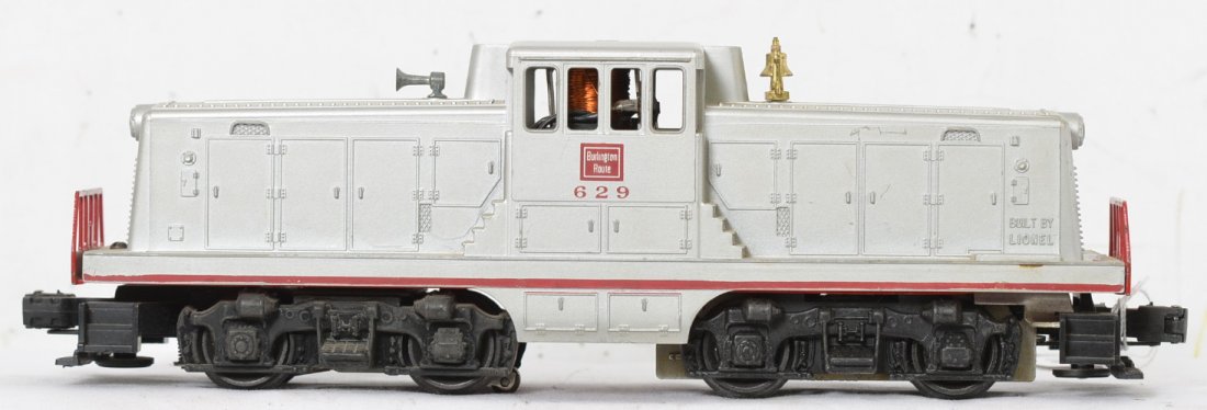Lionel 629 Burlington 44 ton switcher: Nice looking switcher but the cab roof has paint rubs around the edges and slightly smudged lettering on one side. the silver is pretty clean otherwise and the frame is very clean with a few small pai