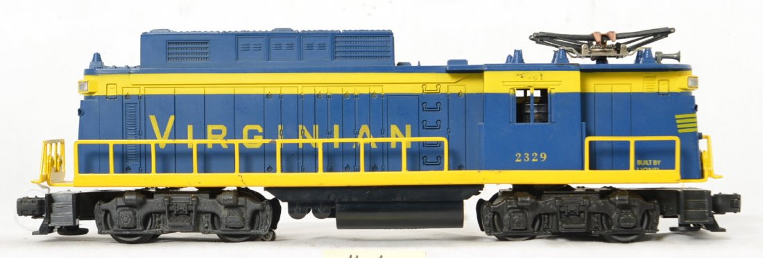 Lionel 2329 Virginian rectifier locomotive: Nice looking locomotive with what appears to be factory repainting of the frame but only a few chips here and there with a long vertical screw crack on the front but very clean otherwise with few sign