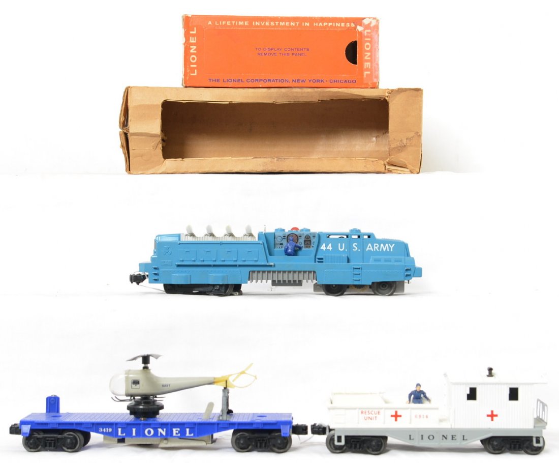 Lionel 44 3419 6814 w/ 2 OBs: Lot includes an undamaged 44 U.S. Army mobile missile launcher with a rough original box. The launcher looks like it was hardly run at all but has signs of handling and paint rubs on the raised edges,