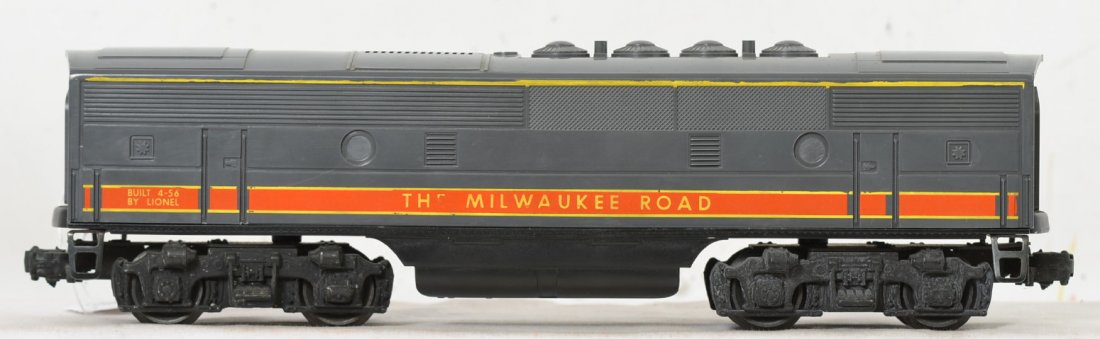 Lionel 2378 Milwaukee Road F3 B Unit w/ yellow stripe: Super clean and almost no run time at all on this beauty, complete yellow stripes and perfect heat stamped lettering on one side but missing the Ã’EÃ“ in Ã’THEÃ“ on the other side. Very ni