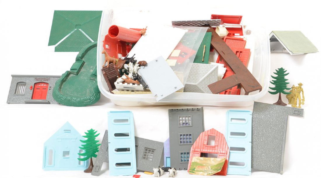 Group of Plasticville buildings animals etc: Group includes several buildings, animals and even a few Marx western figures. Includes at least a police station, barn and a few houses. This is a General Condition lot meaning we have not graded or