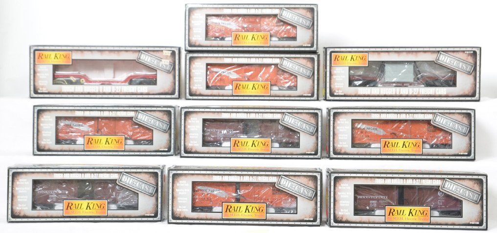10 Railking die cast cars Western Pacific,: MTH Railking modern O gauge die cast freight cars in OBs. Ten cars include five 8402 Western Pacific boxcars, three 8401 Pennsylvania boxcars, 8203 Illinois Central depressed center flat, and 8301 San