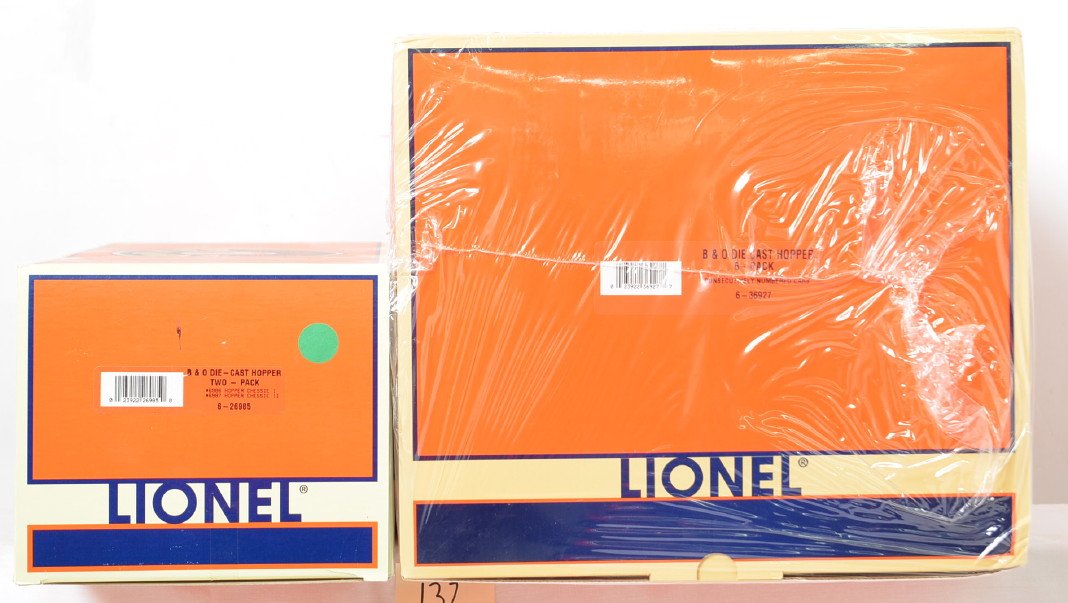 Lionel 36927 B&O die cast hopper six pack and add on: Lionel modern O gauge 36927 Baltimore and Ohio die cast hopper six pack factory sealed in plastic C10. Also includes 26985 die cast Baltimore and Ohio two pack in C8 condition.
