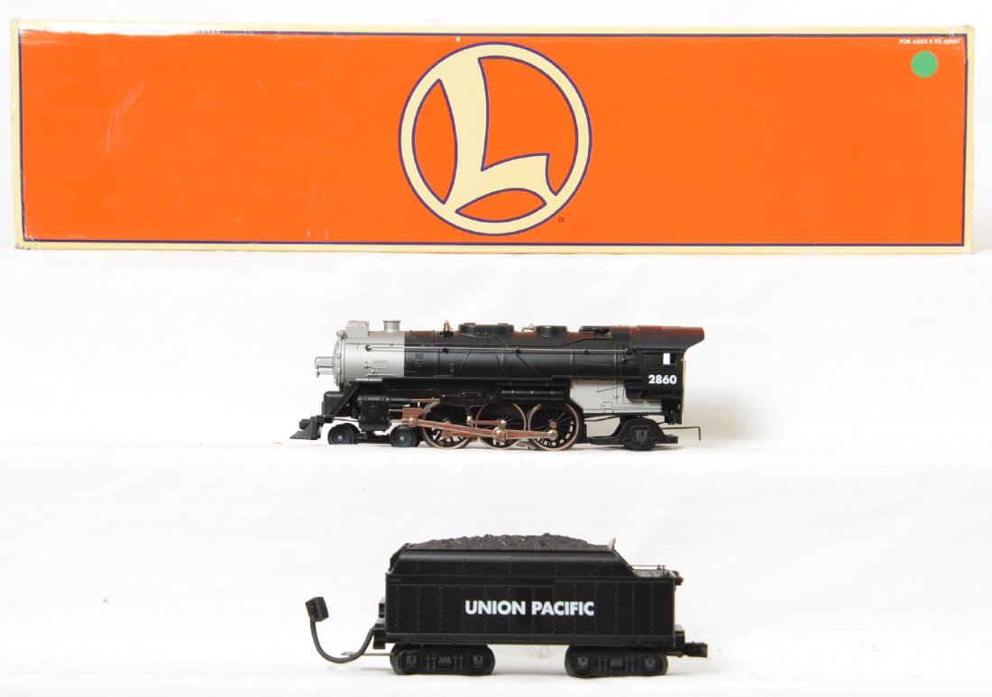 Lionel Union Pacific 4-6-2 with TMCC: Lionel modern O gauge Union Pacific 4-6-2 steam locomotive in OB. Catalog number 28034. Loco features TMCC, Railsounds, Electrocouplers and more. Loco is C7-8 with moderate run time. OB has some corne