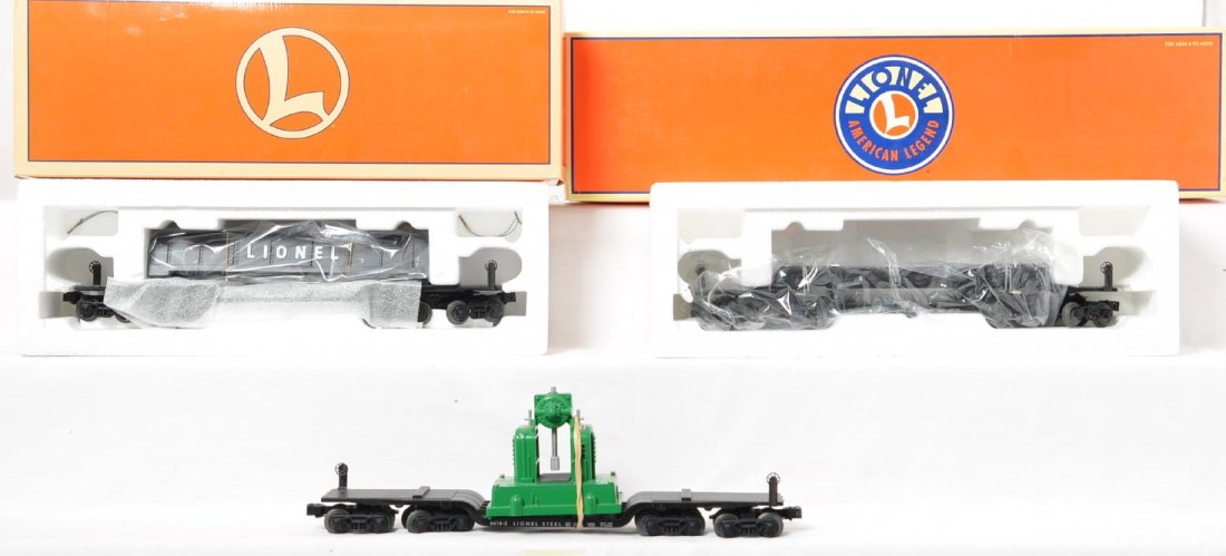 3 Lionel depressed center flats 36900 26971: Lionel modern O gauge depressed flat cars in OBs. Three cars include two 26971 flats with steel loads, one missing outer box, and 36900 depressed flat with backshop load missing inner carton. Items ar