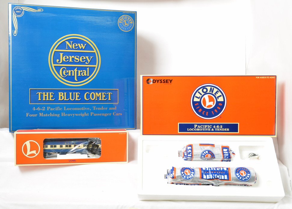 Lionel 21787 Blue Comet set: Lionel modern O Gauge 21787 Jersey Central Blue Comet set in original box. Loco in set features TMCC, Railsounds, fan driven smoke unit and much more. Trains are all factory wrapped in their packing C