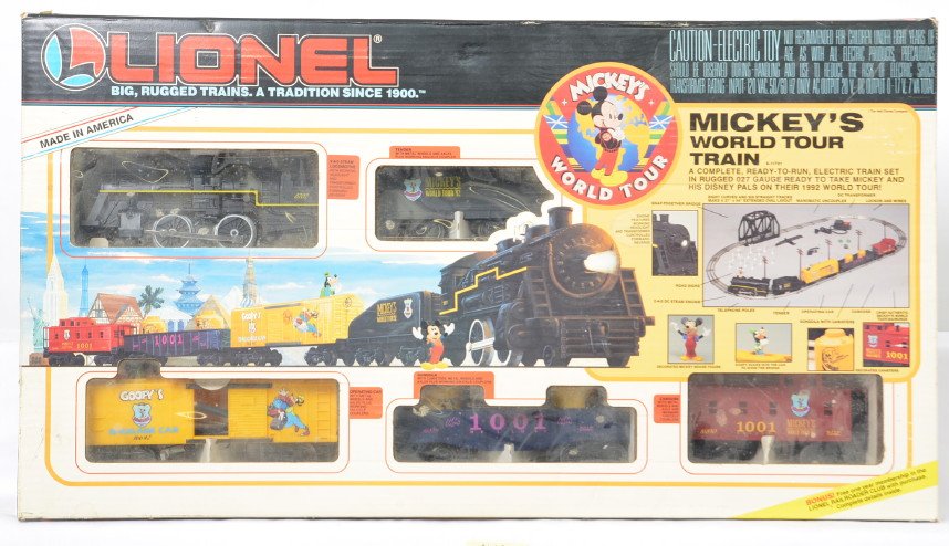Lionel 11721 Mickey's World Tour set: Lionel modern O gauge 11721 Mickeys World Tour set. Set is complete and in C8 condition with run time. OB has some light dust and a few spots.