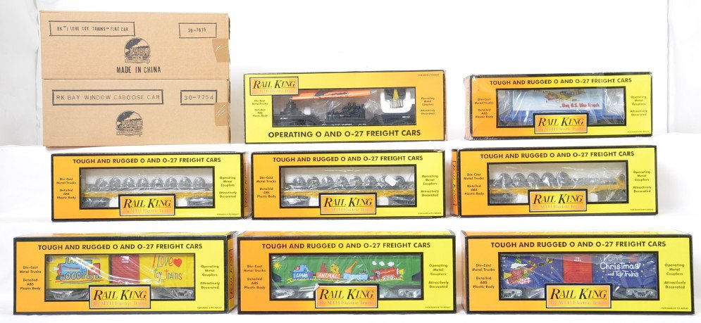 10 Railking freight cars 7668, 7754, 7451, 7499, etc: MTH Railking modern O gauge freight cars in OB. Ten freight cars include 7914 New York Central searchlight, 76027 MTH flat with billboard, 7675 I Love Toy Trains flatcar, 7754 ILTT caboose, three 7668