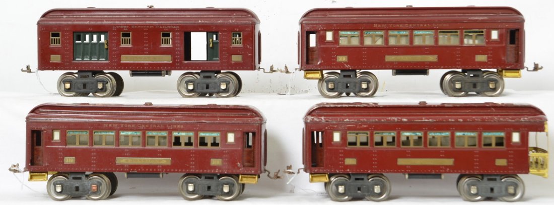 Lionel prewar standard 319 319 320 322 passenger set: Includes two 319 Pullman, 320 railway mail and 322 observation cars. All original with paint wear and scratches and possibility of dents and dings, overall C5-6.