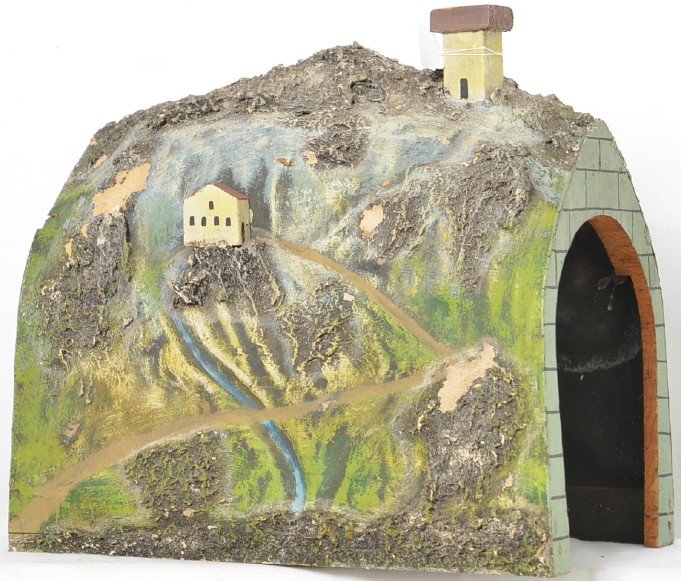 Marklin gauge 1 or gauge 2 wooden frame tunnel: Tunnelis 15â€ long and the portal is 8 3/4â€ tall with the total height being 13 3/4â€. There is some damage including a cracked wood portal and some surfacewear on the paper mache parts. mar
