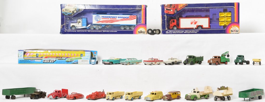 Group of die cast and plastic toy automobiles: Includes Dinky, Corgi, Norev, Tootsietoy, Manoil, Siku and Ralstoy items. This is a General Condition lot meaning we have not graded or examined every item in the lot so the condition will typically v