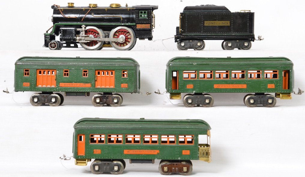 Lionel standard gauge 384E 384T 332 339 341 set: Nice set that includes 384E 2-4-0 steam locomotive 384T tender, 332 railway mail, 339 Pullman and 341 observation. Loco has been re-wheeled and the peacock passenger cars have all new latch couplers.