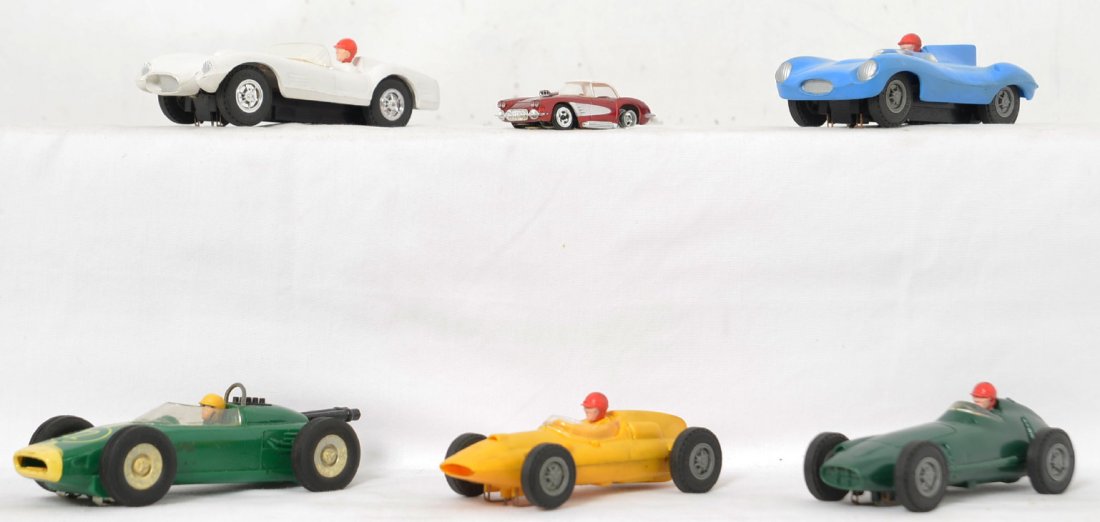 Four Lionel one Marx and one Tyco pro slot cars: Small group of slot cars to include four 1/32 Lionel cars, one 1/32 Marx Lotus Ford and one HO scale Tyco Pro Corvette. They are all in nice shape with no body modifications and all tires are intact e