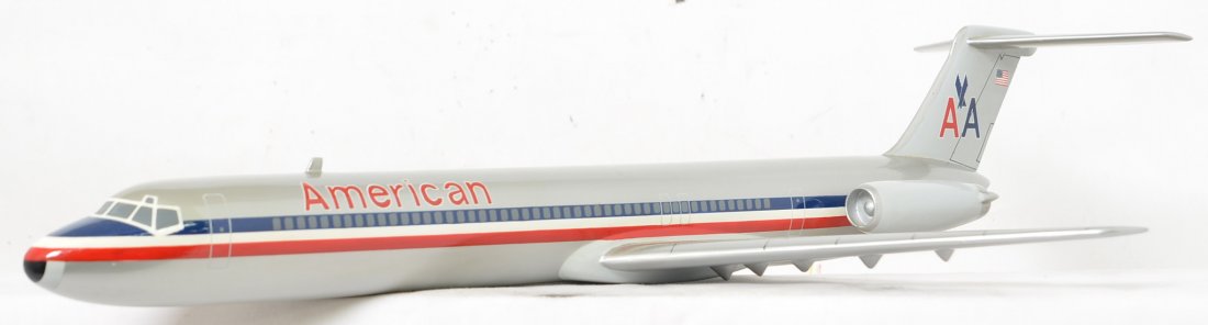 Beautiful American Airlines McDonnell Douglas DC-9: Nice vintage desk display jet with fantastic graphics and a nice wood and metal display pedestal. The jet measures 23 1/2â€ long and has a 17 1/2â€ wing span. It does come with a custom made and
