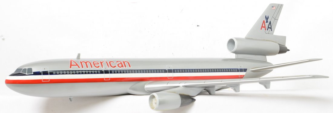 American Airlines McDonnell Douglas DC-10 Desk Display: Neat vintage desk display jet with fantastic graphics but there is a jet engine broken off of the right wing. It was a clean separation and will be able to be glued back with no missing material but t
