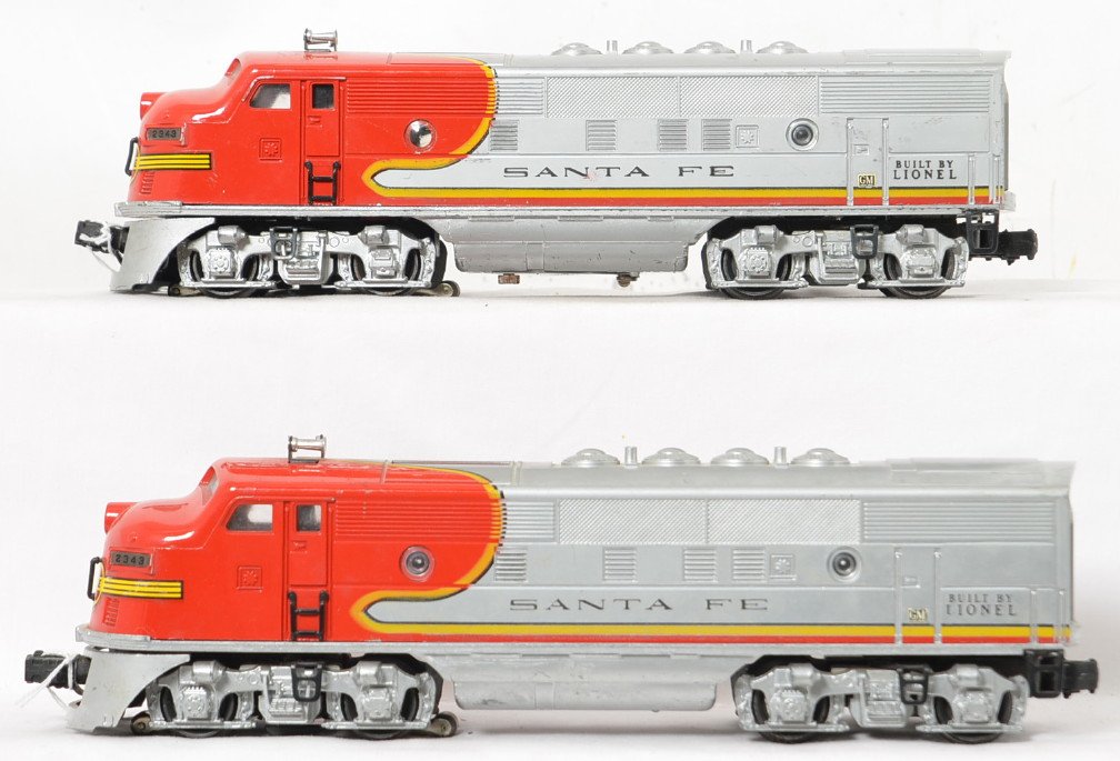 Lionel Postwar O gauge Santa Fe 2343 F-3 AA: Lionel Postwar O gauge Santa Fe F-3 AA units in nice shape. These do have some scratches on the bellies as well as some minor play wear on the shells but display very nicely overall, C6-7.